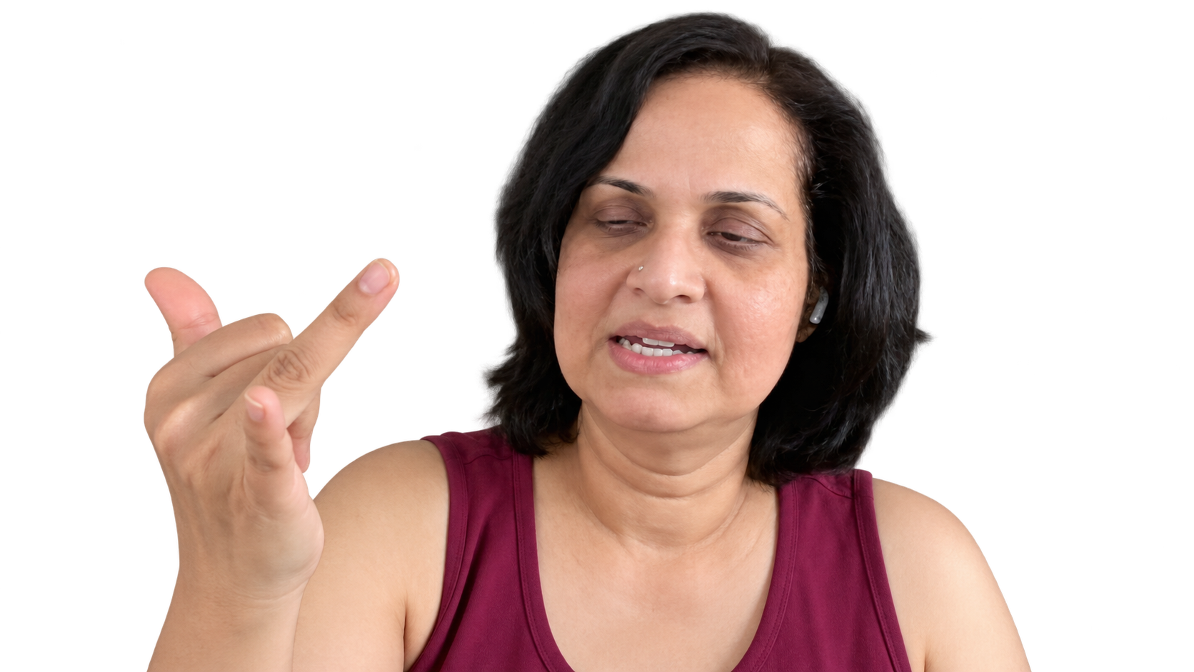 Dr. Malathi shows the hand setup for alternate nostril breathing, with the index and middle fingers folded.