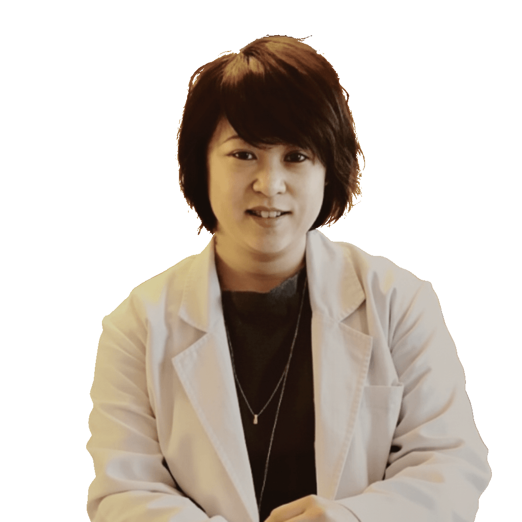 Dr. Deborah Ma wearing her white clinic coat