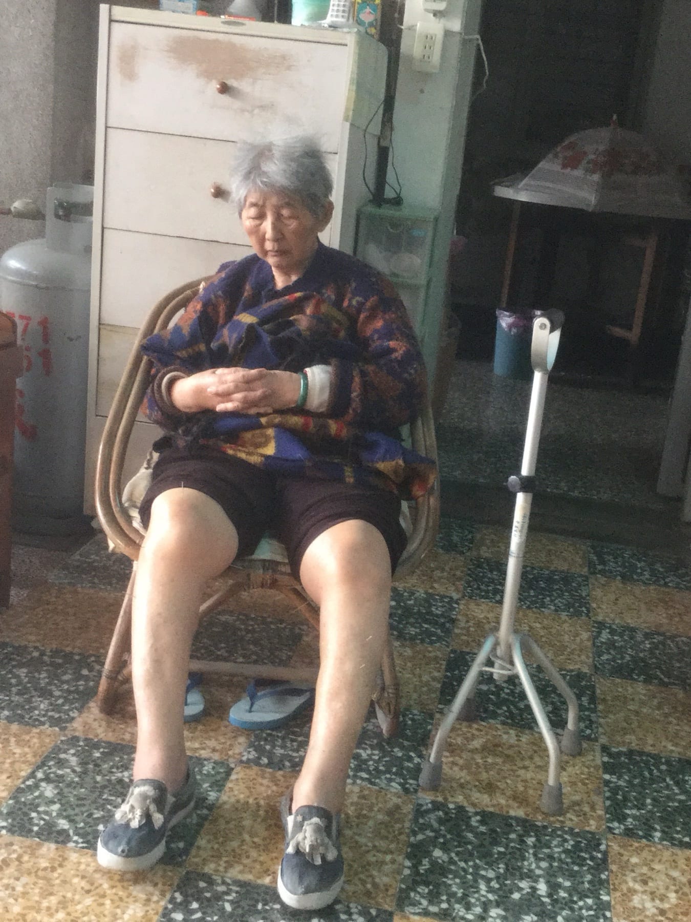 Dr Deb Ma treating her grandmother's knee with acupuncture, 24 years ago
