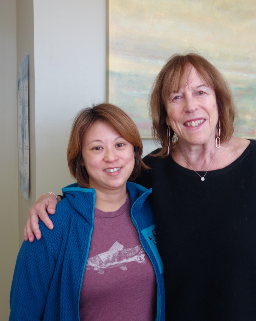 Dr. Deb with a patient at the clinic