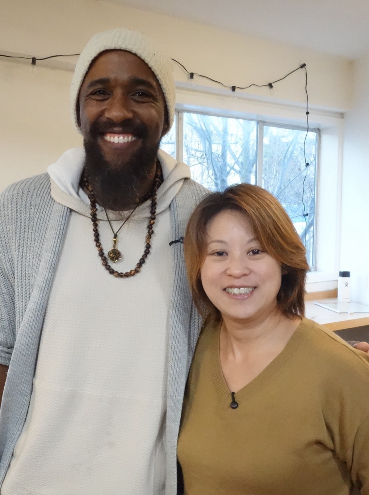 A smiling patient with Dr Deb Ma at Puzzle Acupuncture